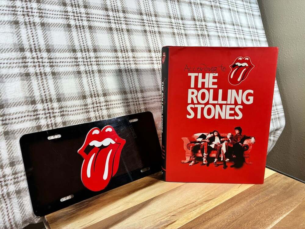 According To The Rolling Stones Hardcover Book And Metal License Plate